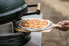 Preparing a fresh pizza with the Big Green Egg Pizza Oven Wedges, perfect for authentic wood-fired cooking in Northern and Southern Ireland.