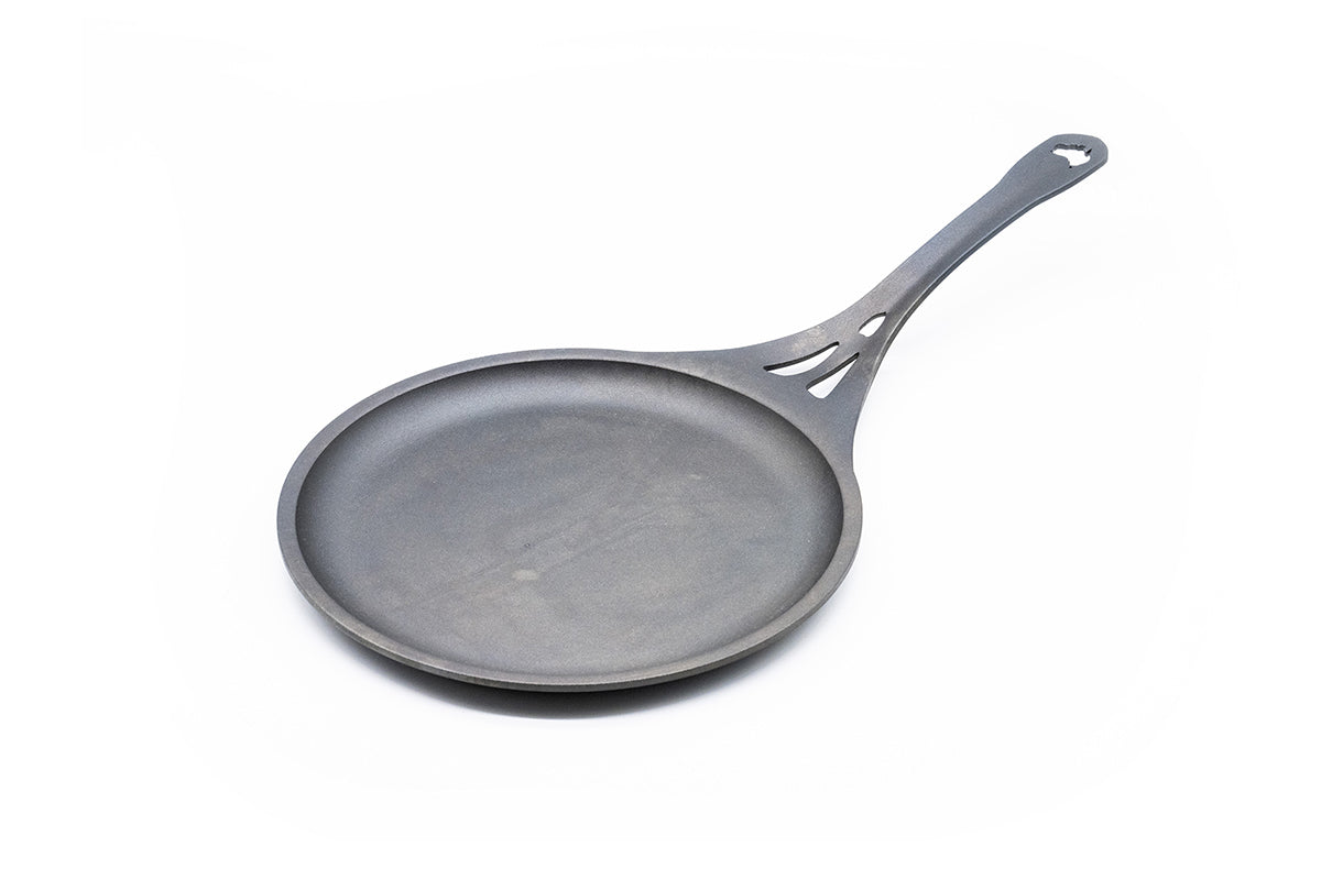 Solidteknics 24cm Iron Crêpe Pan - durable, pre-seasoned skillet ideal for crêpes, pancakes, flatbreads, and high-heat cooking, available at Stove Yard Cheshire.