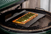 Solidteknics iron baking tray with a golden asparagus tart baking on a Big Green Egg, available at Stove Yard Cheshire.