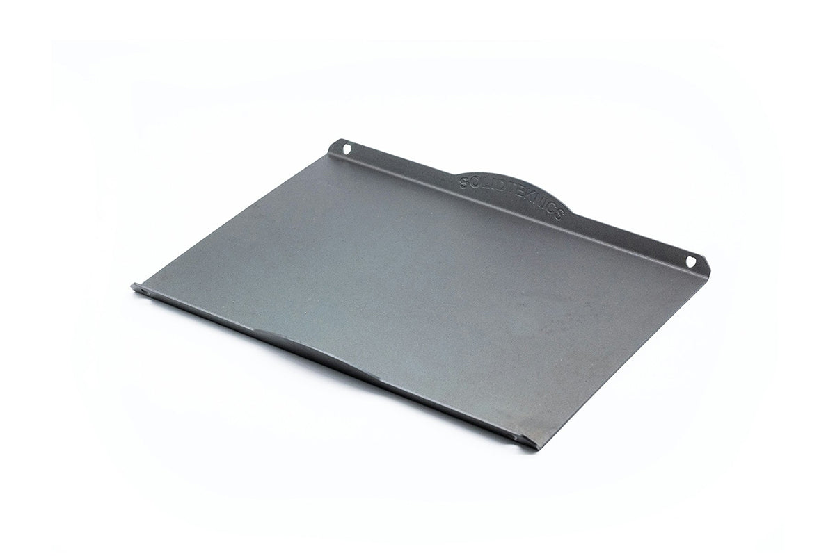 Solidteknics iron baking tray designed for even heat distribution, ideal for use on Big Green Egg and standard ovens, available at Stove Yard Cheshire.